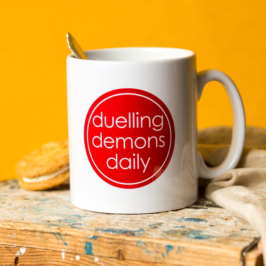 Duelling Demons Mug