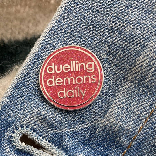 Duelling Demons Glitter Enamel Pin